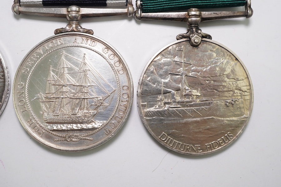 Four assorted Naval service medals; EVII RNRLSGC to 84333 G.Mitchell, Sea'n. 1CL. R.N.R.; GV RFRLSGC to J.99193 (Dev.B.15185) J.M.Dougall. A.B.R.F.R.; ERII RFRLSGC to SSSx.27156 J.W.Hopkins. Dev.B.17913.A.B. R.F.R; ERII